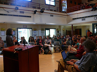 Students, faculty, and staff participate in the weekly All College Meeting.